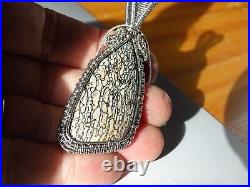 Fossilized Dinosauer Bone Handmade Wire Weave Pendant Beautiful Cells & Colors